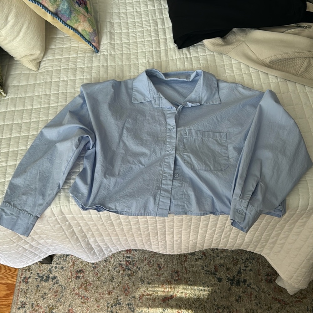 Ive had it for a while, no tags, forget the brand. A solid staple to have though